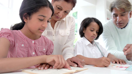 family-looking-at-papers-seriously