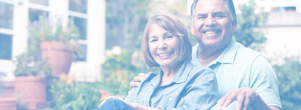 older-couple-smiling-and-looking-at-couple