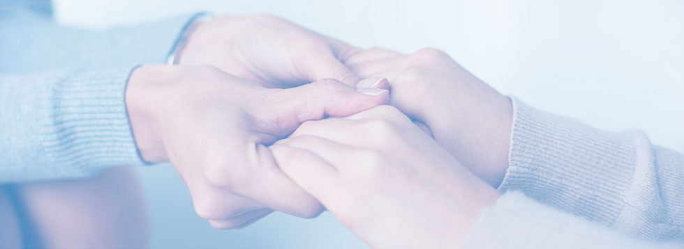 two-people-holding-hands