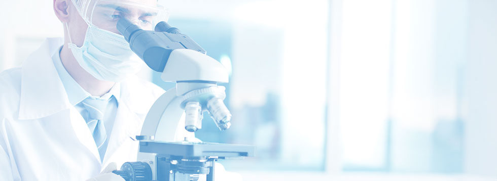 scientist-looking-through-microscope